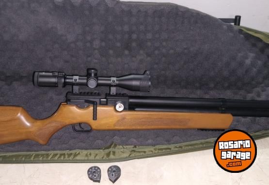 Deportes - Vendo Rifle PCP R2 800 con mira telescpica, inflador y funda - En Venta
