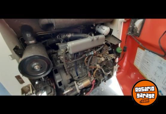 Camiones y Grúas - Mini cargadora BOBCAT S205 - En Venta