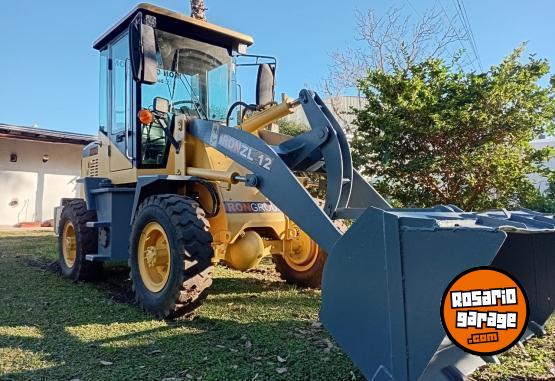 Camiones y Grúas - PALA FRONTAL IRON ZL 12 - En Venta