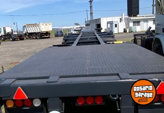 Camiones y Gras - ARAA PORTACONTENEDOR MARCA OMBU 0KM 2+1 - En Venta