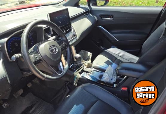 Autos - Toyota COROLLA CROSS HYBRIDA SEG 2022 Electrico / Hibrido 64000Km - En Venta