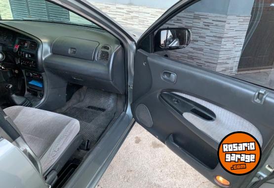 Autos - Mazda 323 1997 GNC 270100Km - En Venta