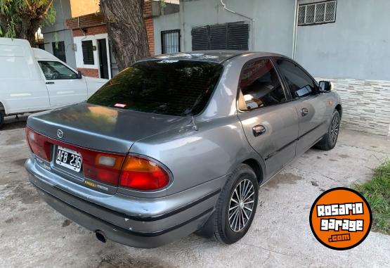 Autos - Mazda 323 1997 GNC 270100Km - En Venta