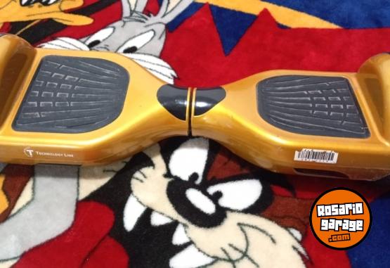 Electrnica - Patineta elctrica con cargador, hay q cambiar batera para q ande - En Venta