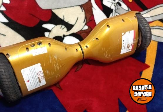 Electrnica - Patineta elctrica con cargador, hay q cambiar batera para q ande - En Venta