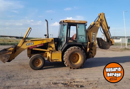 Camiones y Grúas - Pala retro John Deere 310e modelo 2002 - En Venta
