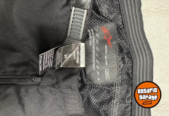 Accesorios para Motos - Pantalos rojo y negro alpinestars Talle 34 Modelo: fluido speed - En Venta