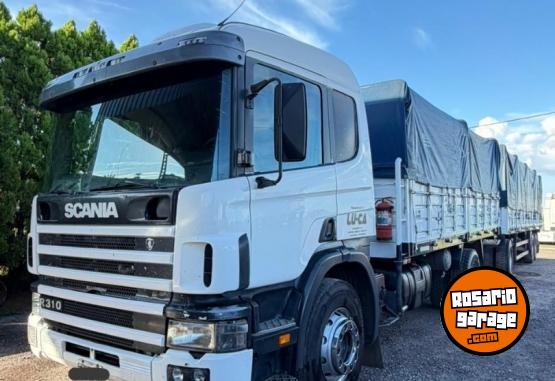Camiones y Gr�as - Scania P94 310 - En Venta