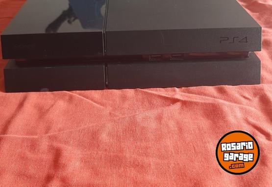 Electr�nica - PS4 Fat con Sistema 11.50 1 joystick y dos juegos con caja. - En Venta