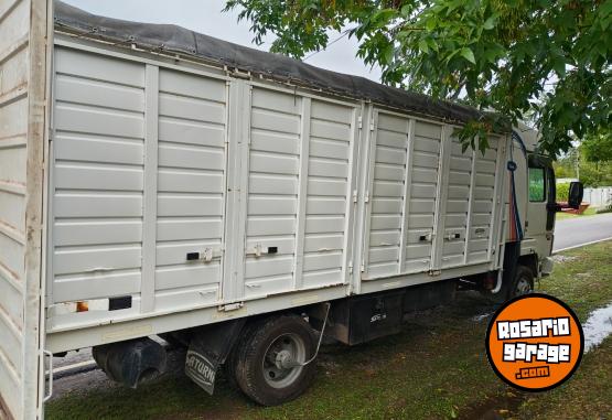 Camiones y Grúas - Ford Cargo 915 con cama - En Venta