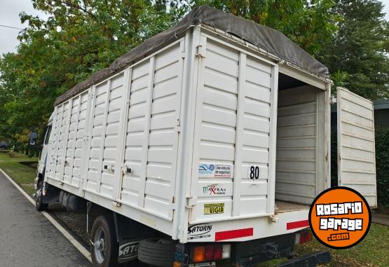 Camiones y Grúas - Ford Cargo 915 con cama - En Venta
