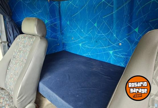Camiones y Grúas - Ford Cargo 915 con cama - En Venta