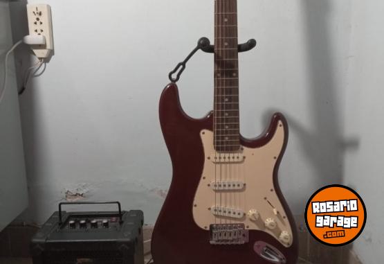 Instrumentos Musicales - guitarra electrica + amplificador, tripode y funda - En Venta