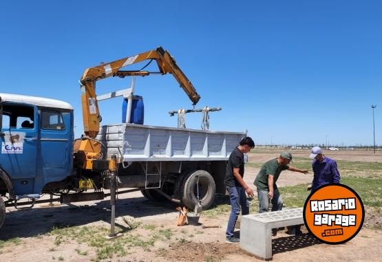 Camiones y Grúas - CAMION MERCEDES 1114 CON HIDROGRUA Y VOLCADOR - En Venta