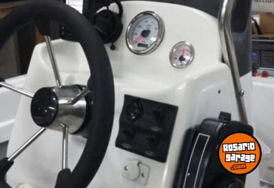 Embarcaciones - Lancha tracker consola central con motor Mercury 60HP 4T - En Venta