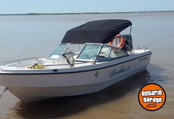 Embarcaciones - Trucker Electra 560 con motor Mercury 115HP Optimax (año 2013) - En Venta