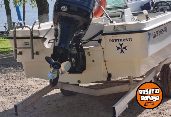 Embarcaciones - Trucker Electra 560 con motor Mercury 115HP Optimax (año 2013) - En Venta