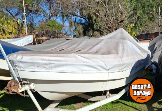 Embarcaciones - Trucker Electra 560 con motor Mercury 115HP Optimax (año 2013) - En Venta