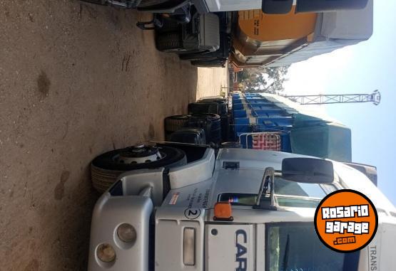 Camiones y Grúas - Ford cargo 1831 con batea ombu - En Venta