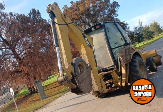 Camiones y Grúas - RETROEXCAVADORA CATERPILLAR 416E2 - En Venta