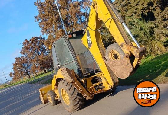 Camiones y Grúas - RETROEXCAVADORA CATERPILLAR 416E2 - En Venta