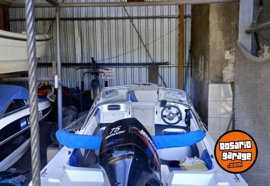 Embarcaciones - TRAKKER 520 MOTOR MERCURY 75 HP Y MOTOR AUXILIAR JOHNSON 5 HP - En Venta