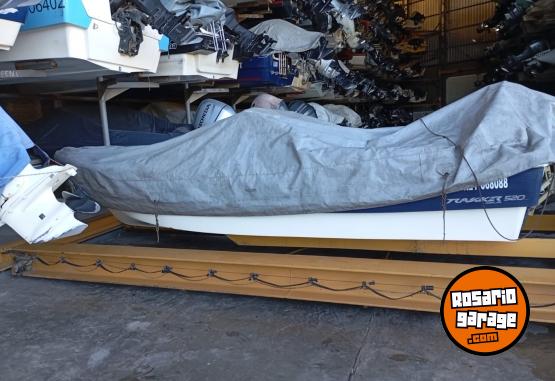 Embarcaciones - TRAKKER 520 MOTOR MERCURY 75 HP Y MOTOR AUXILIAR JOHNSON 5 HP - En Venta