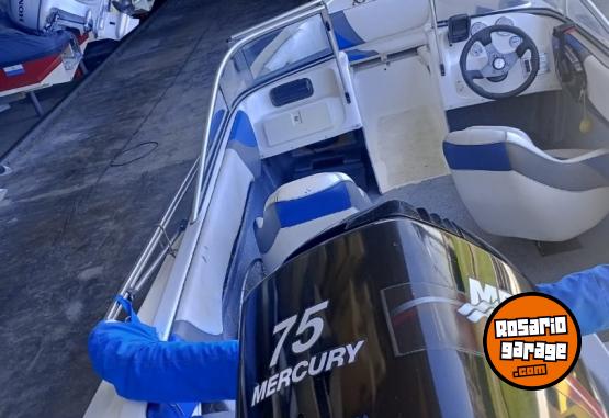 Embarcaciones - TRAKKER 520 MOTOR MERCURY 75 HP Y MOTOR AUXILIAR JOHNSON 5 HP - En Venta