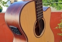 Instrumentos Musicales - Vendo guitarra electroacustica parquer como nueva - En Venta