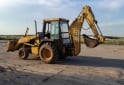 Camiones y Grúas - Pala retro John Deere 310e modelo 2002 - En Venta