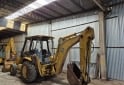 Camiones y Grúas - retroexcavadora Caterpiller 416 C - En Venta