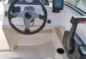 Embarcaciones - Trucker Electra 560 con motor Mercury 115HP Optimax (año 2013) - En Venta
