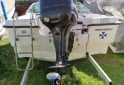 Embarcaciones - Trucker Electra 560 con motor Mercury 115HP Optimax (año 2013) - En Venta