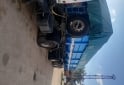 Camiones y Grúas - Ford cargo 1831 con batea ombu - En Venta