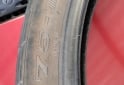 Accesorios para Motos - Vendo escapé y cubiertas - En Venta