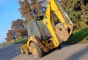 Camiones y Grúas - RETROEXCAVADORA CATERPILLAR 416E2 - En Venta
