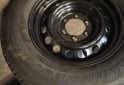 Accesorios para Autos - Cubierta Bridgestone y llantas de chapa nuevas - En Venta
