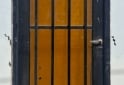 Hogar - PUERTA DE CHAPA CON MARCO, REJAS, POSTIGO Y CERRADURA - En Venta